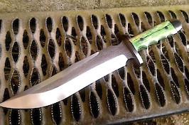 The Outlaw Bowie...a special one-off in CPM S30V, titanium fittings and stabilised giraffe bone The Outlaw Bowie...a special one-off in CPM S30V, titanium fittings and stabilised giraffe bone