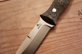 Custom tactical knife made in CPM S90V and black canvas micarta Custom tactical knife made in CPM S90V and black canvas micarta